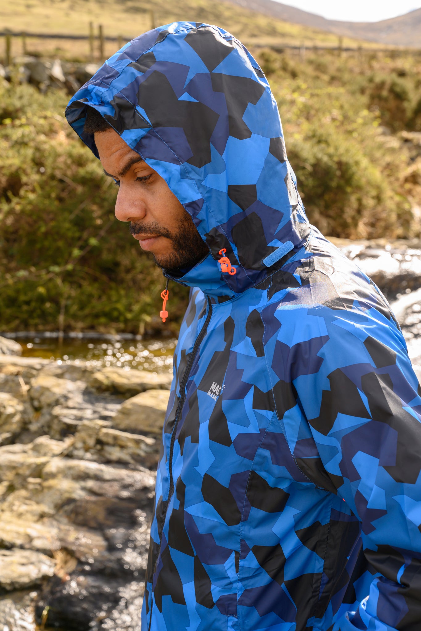Blue camo rain jacket on sale